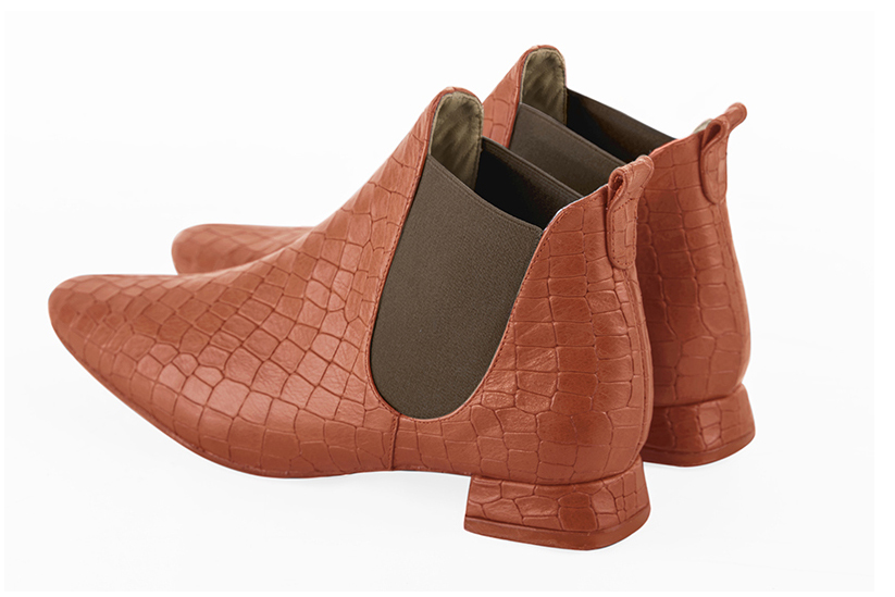 Terracotta orange and taupe brown women's ankle boots, with elastics. Square toe. Flat flare heels. Rear view - Florence KOOIJMAN